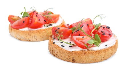 Photo of Tasty rusks with cream cheese, fresh tomatoes and black sesame seeds isolated on white