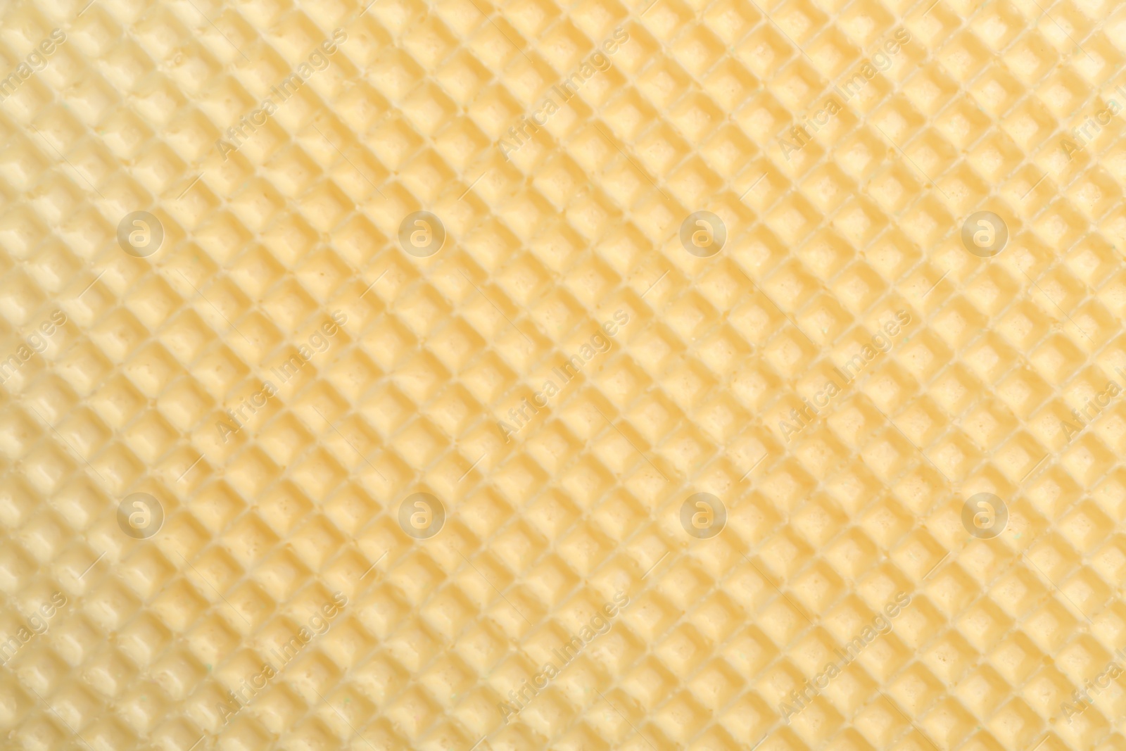 Photo of Tasty wafer as background, closeup. Crispy food