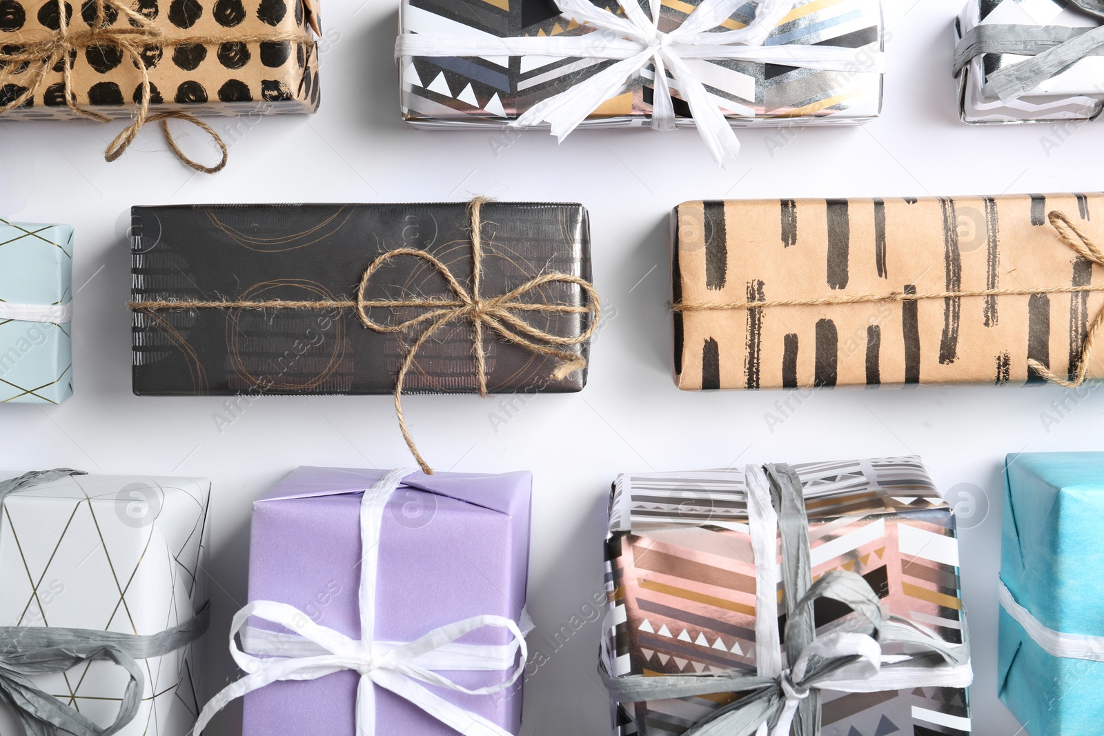 Photo of Beautiful gift boxes on white background, top view