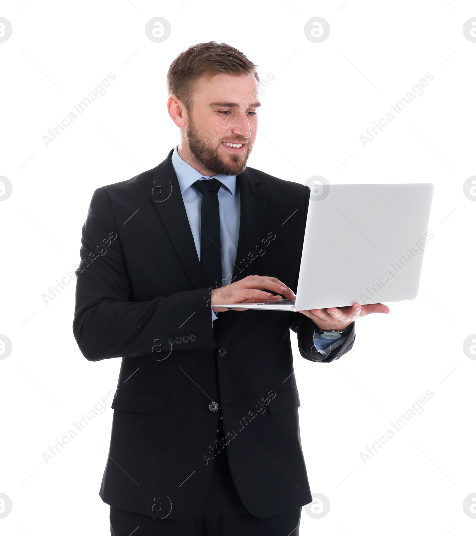 Photo of Happy young businessman using laptop on white background