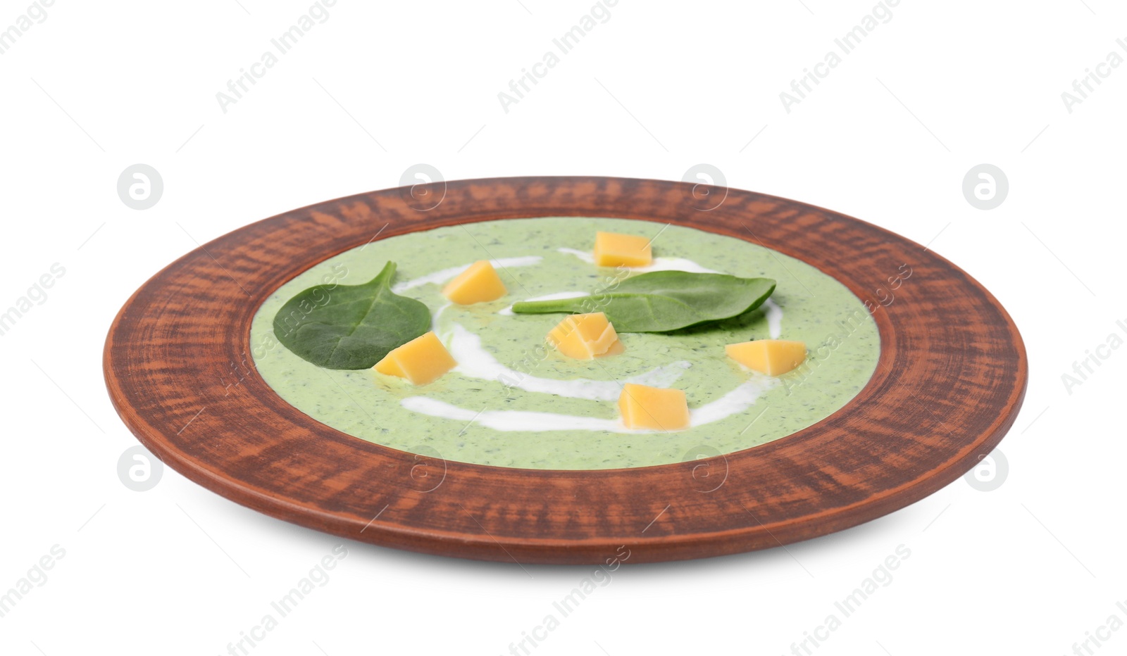 Photo of Delicious spinach cream soup with leaves and cheese in bowl isolated on white