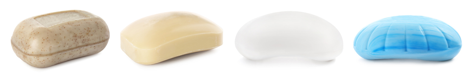 Image of Set of different soap bars on white background. Banner design
