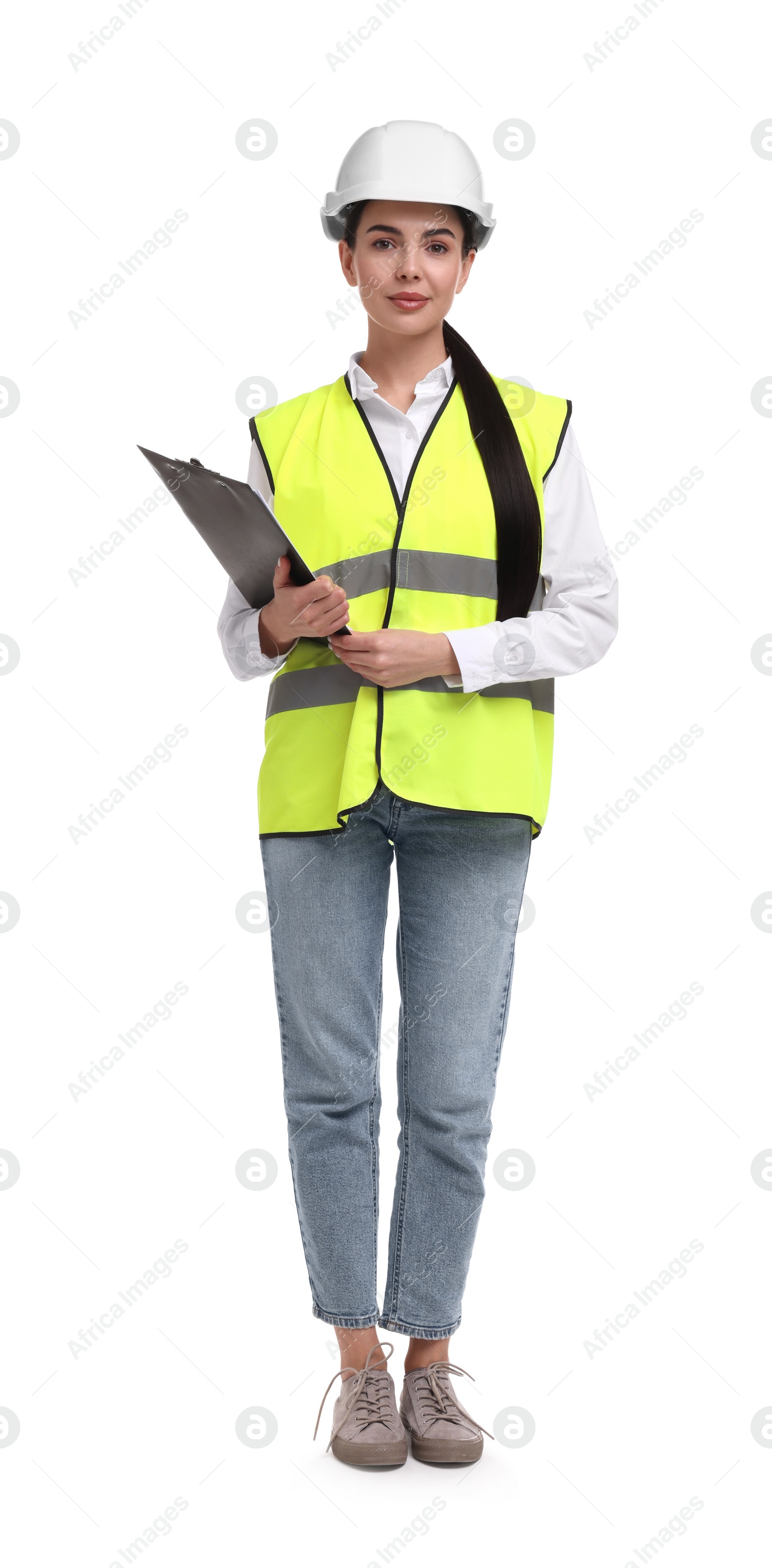 Photo of Engineer in hard hat holding clipboard on white background