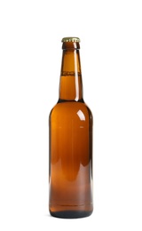 Photo of Bottle of tasty cold beer on white background