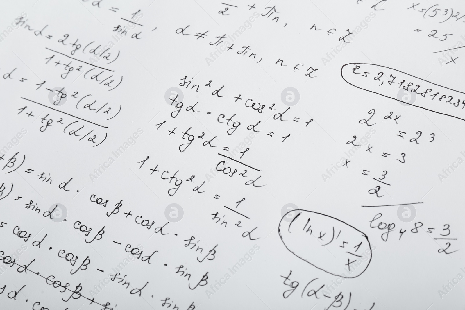 Photo of Sheet of paper with many different mathematical formulas