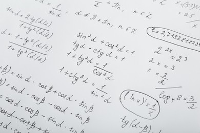 Photo of Sheet of paper with many different mathematical formulas