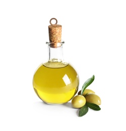 Glass bottle with fresh olive oil on white background