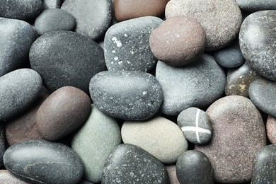 Photo of Many different stones as background, top view