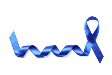 Photo of Blue ribbon on white background. Colon cancer awareness concept