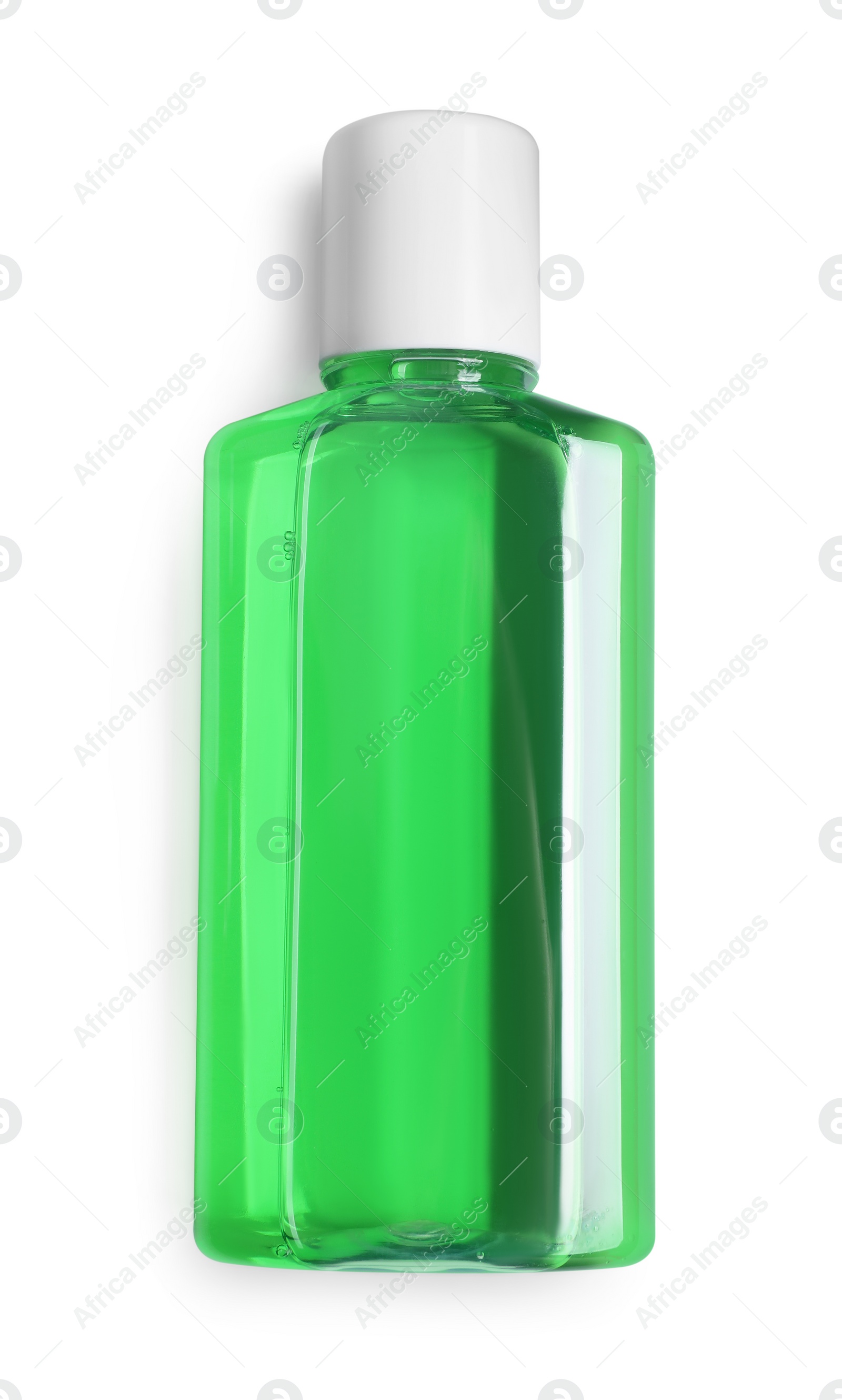 Photo of Fresh mouthwash in bottle isolated on white, top view