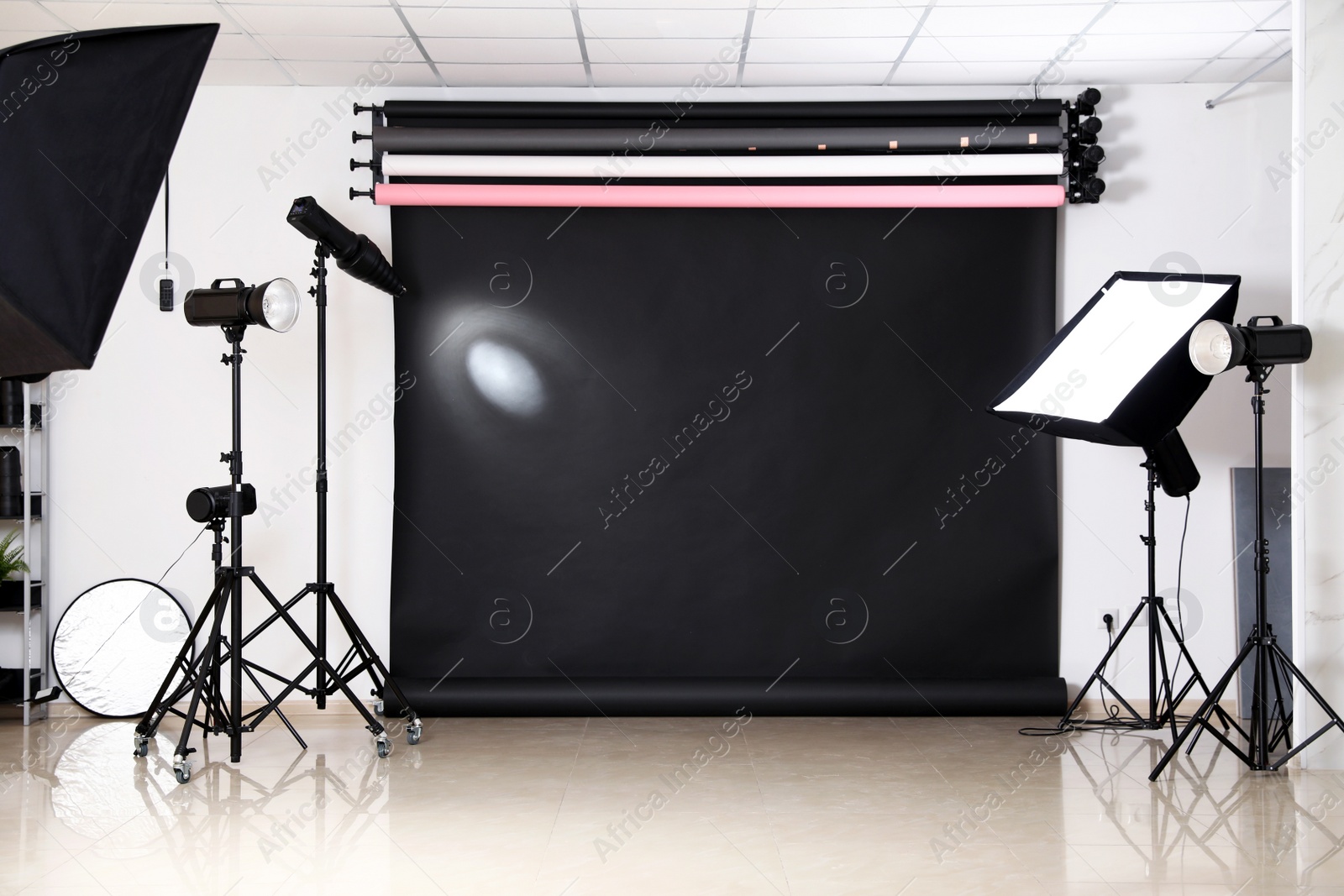 Photo of Photo studio interior with set of professional equipment