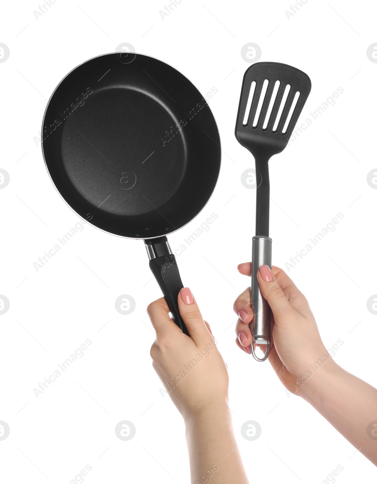 Photo of Woman with spatula and frying pan on white background, closeup