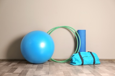 Photo of Hula hoops and other sports equipment in gym