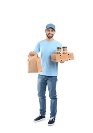 Young courier with different containers on white background. Food delivery service