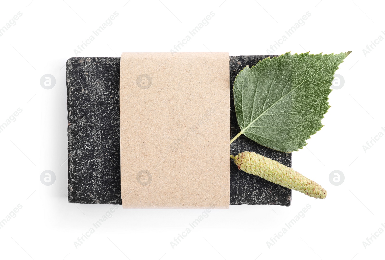 Photo of Tar soap bar isolated on white, top view. Natural product