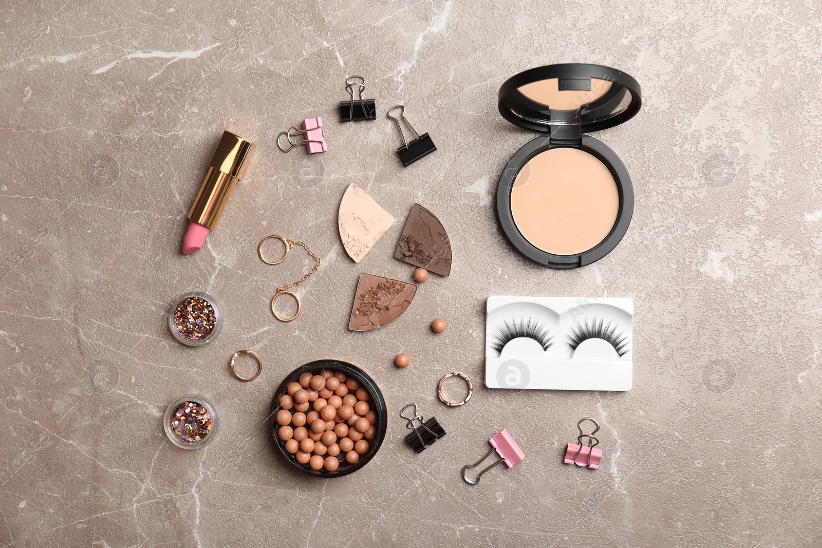 Photo of Flat lay composition with cosmetic products on grey background