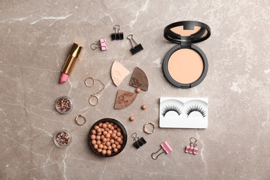 Photo of Flat lay composition with cosmetic products on grey background