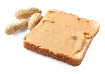 Photo of Tasty peanut butter sandwich and peanuts on white background