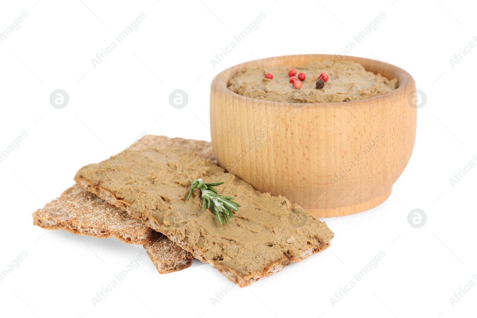 Photo of Tasty liver pate and crispy crackers on white background