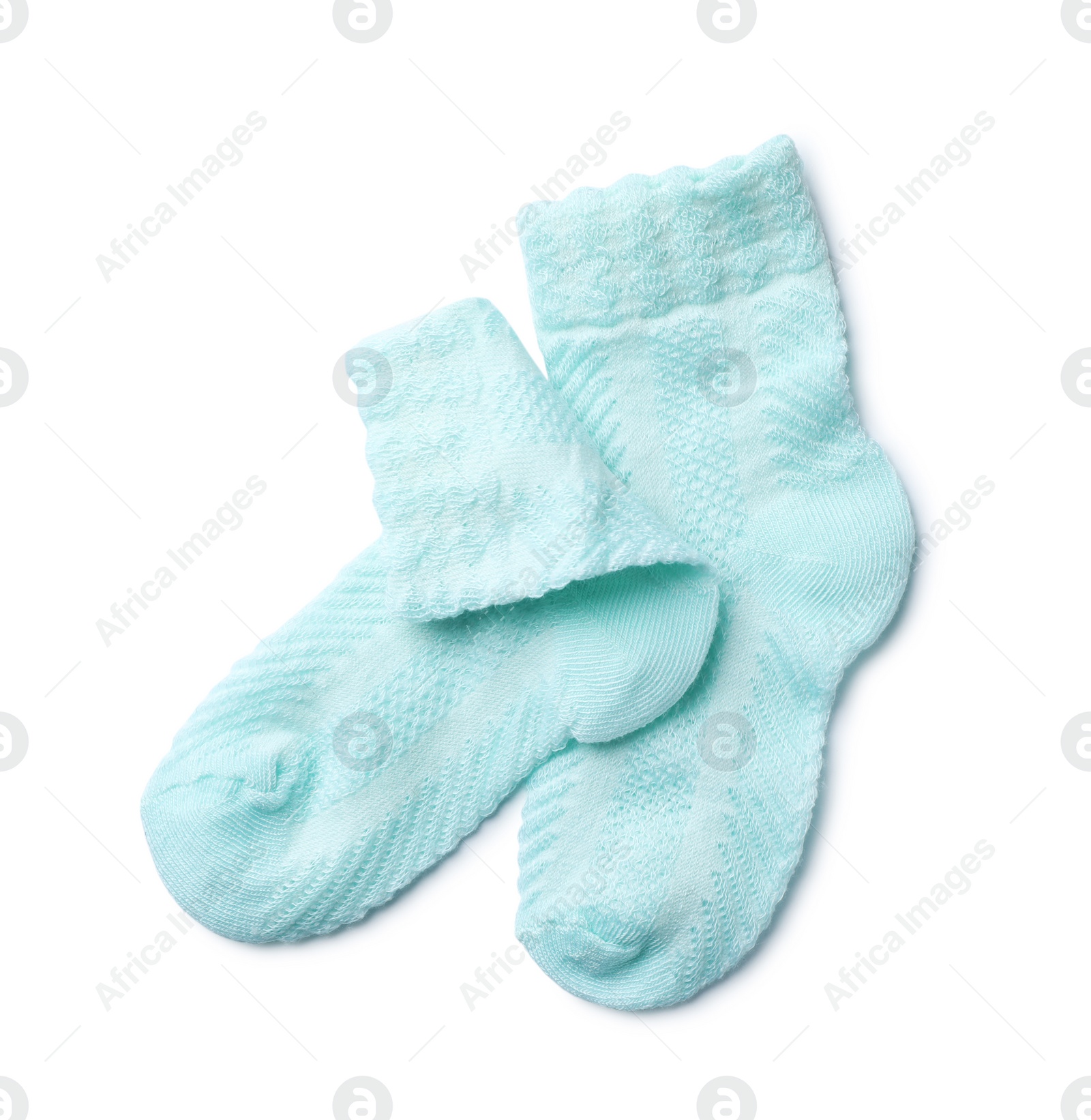 Photo of Cute child socks on white background, top view