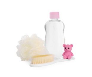 Photo of Baby oil in bottle and accessories isolated on white