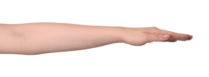 Playing rock, paper and scissors. Woman showing paper sign on white background, closeup