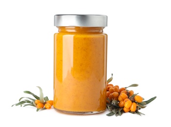 Delicious sea buckthorn jam in jar and fresh berries on white background