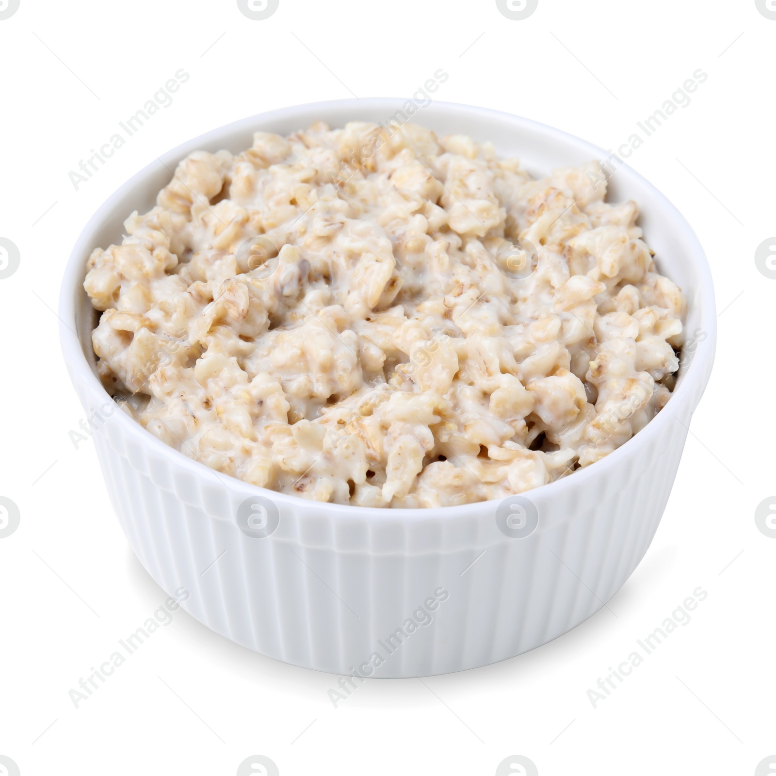 Photo of Ceramic bowl with oatmeal isolated on white