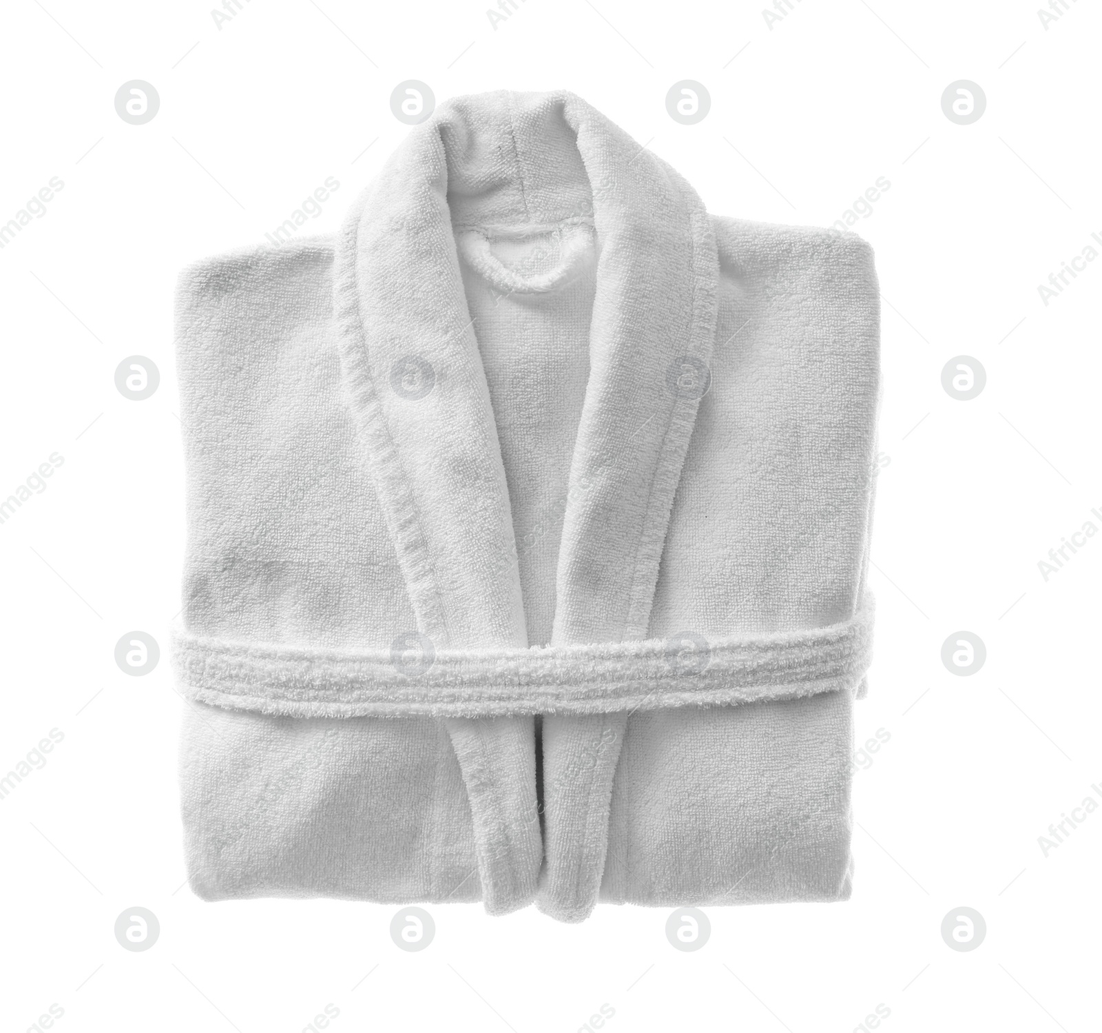 Photo of Clean folded bathrobe isolated on white, top view