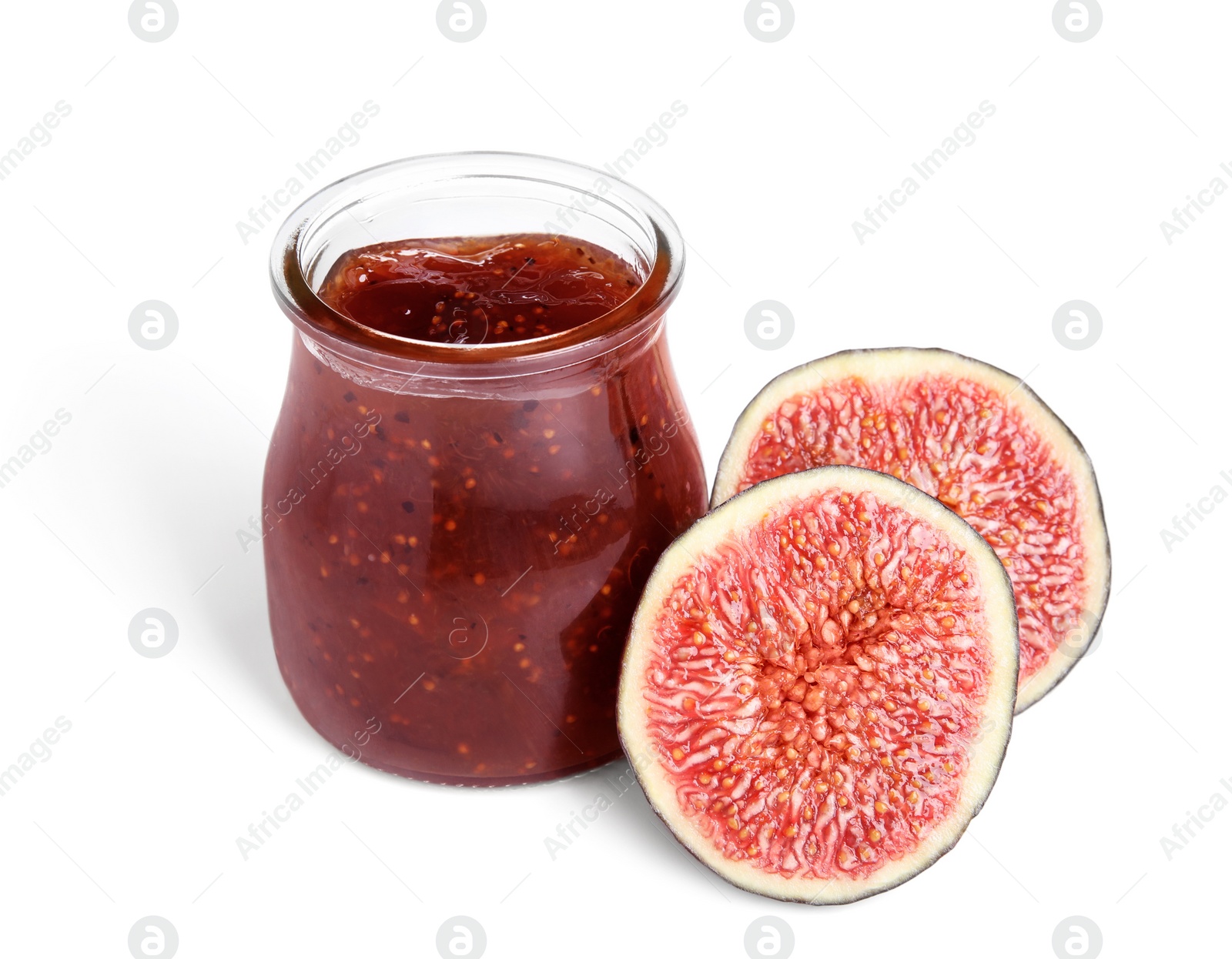 Photo of Glass jar of tasty sweet fig jam isolated on white