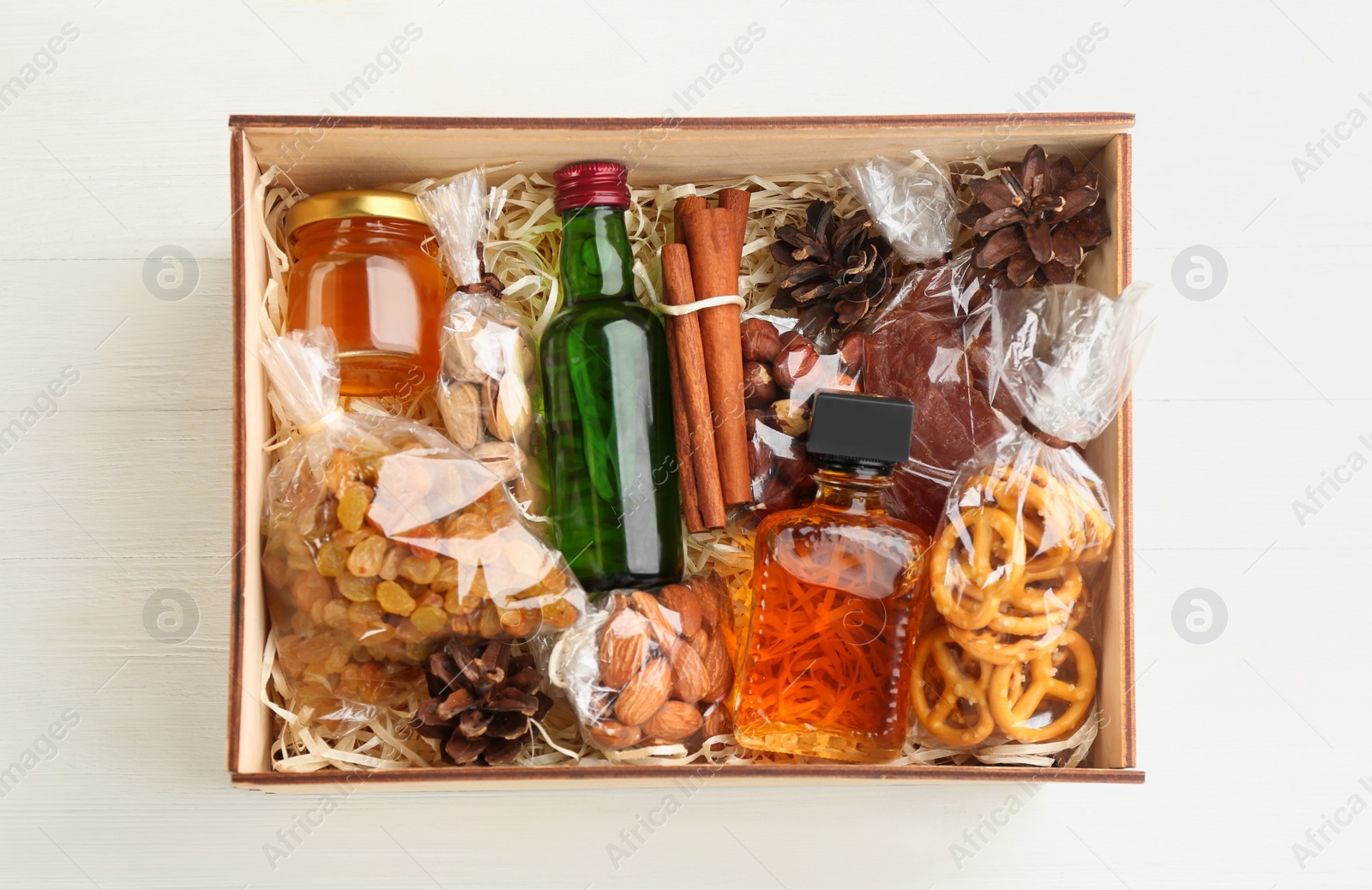 Photo of Stylish gift set on white wooden table, top view