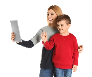 Photo of Mother and her son using video chat on tablet against white background