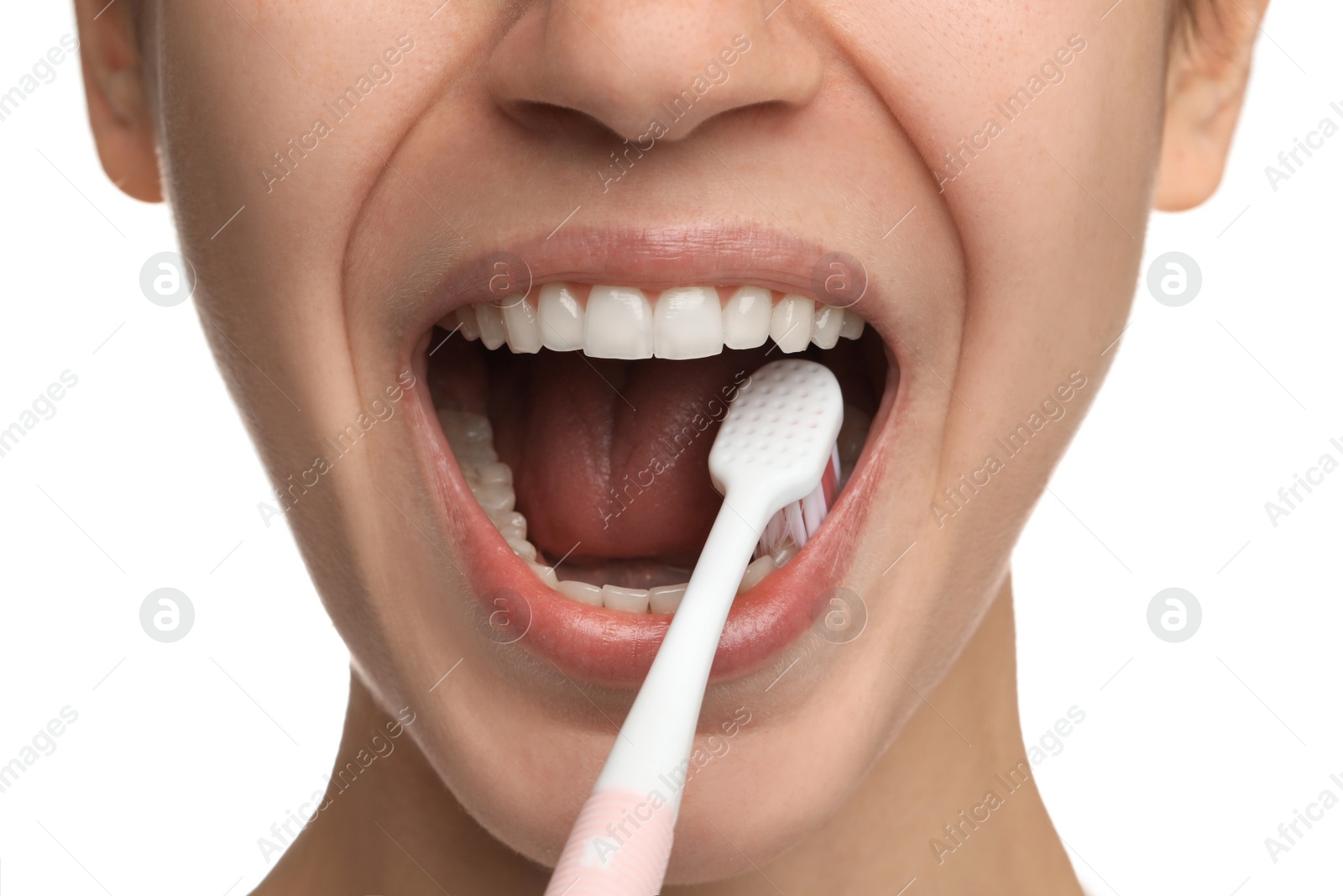 Photo of Woman brushing teeth on white background, closeup. Dental care