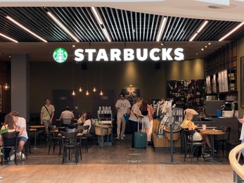 Photo of WARSAW, POLAND - JULY 13, 2022: Starbucks coffee shop in shopping mall
