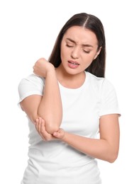 Photo of Young woman suffering from pain in elbow on white background. Arthritis symptoms