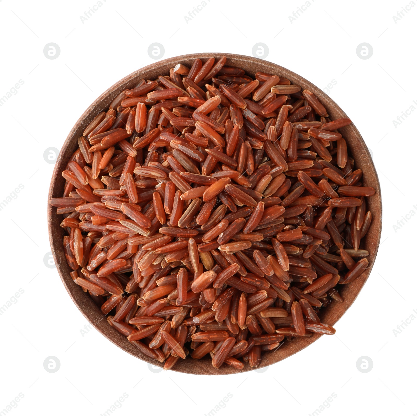 Photo of Wooden bowl with brown rice on white background, top view