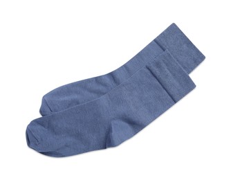 Photo of Pair of blue socks on white background, top view