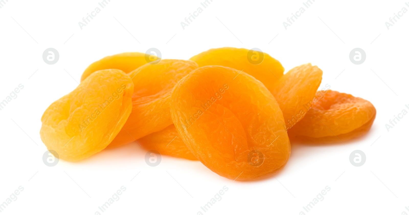 Photo of Pile of tasty apricots on white background. Dried fruits