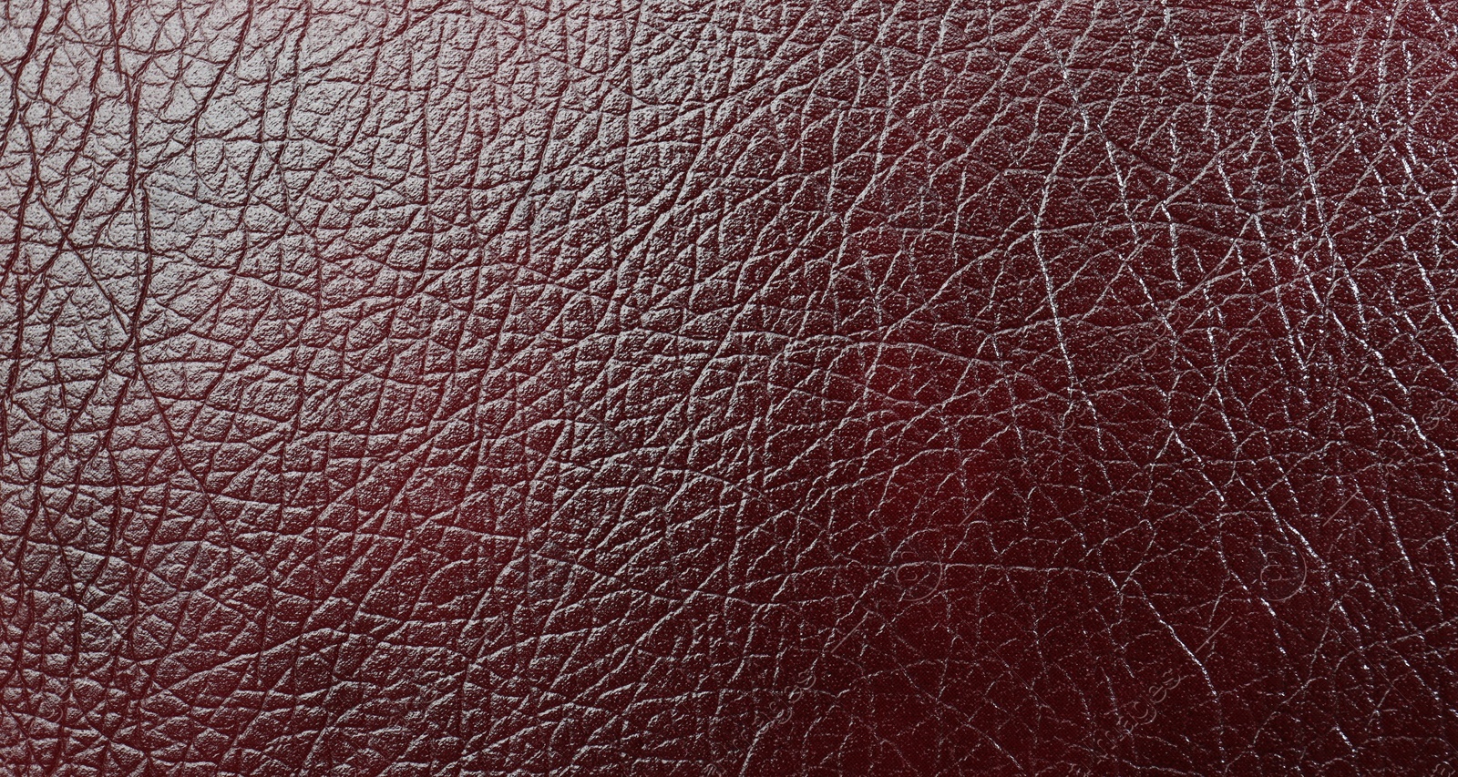 Photo of Texture of natural leather as background, top view