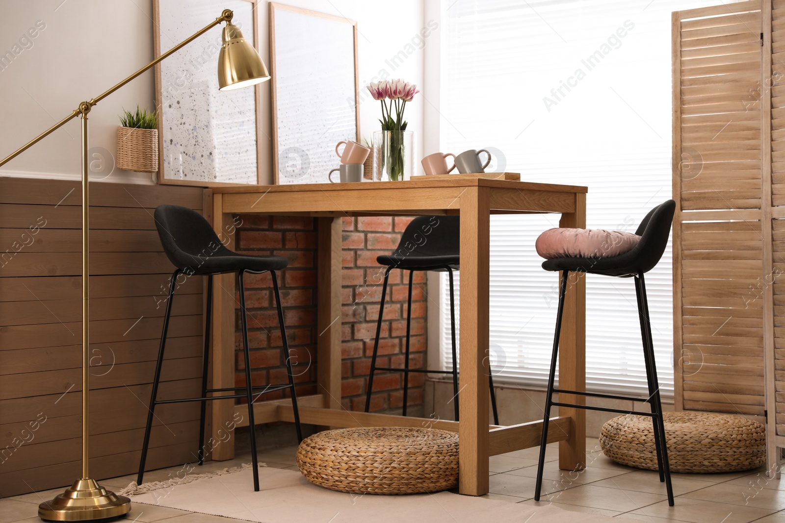 Photo of Stylish room interior with modern furniture and window blinds