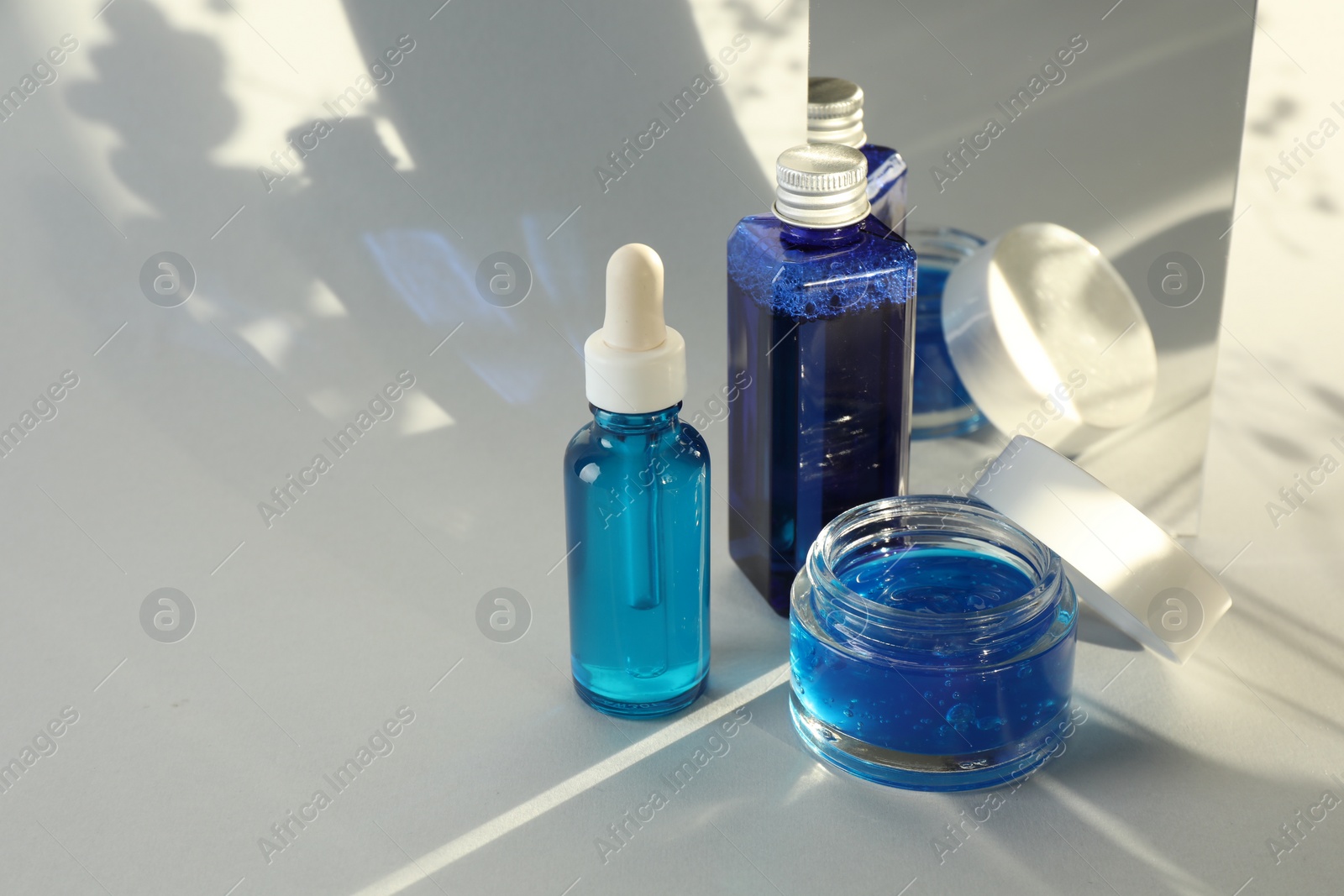 Photo of Set of luxury cosmetic products on white background. Space for text