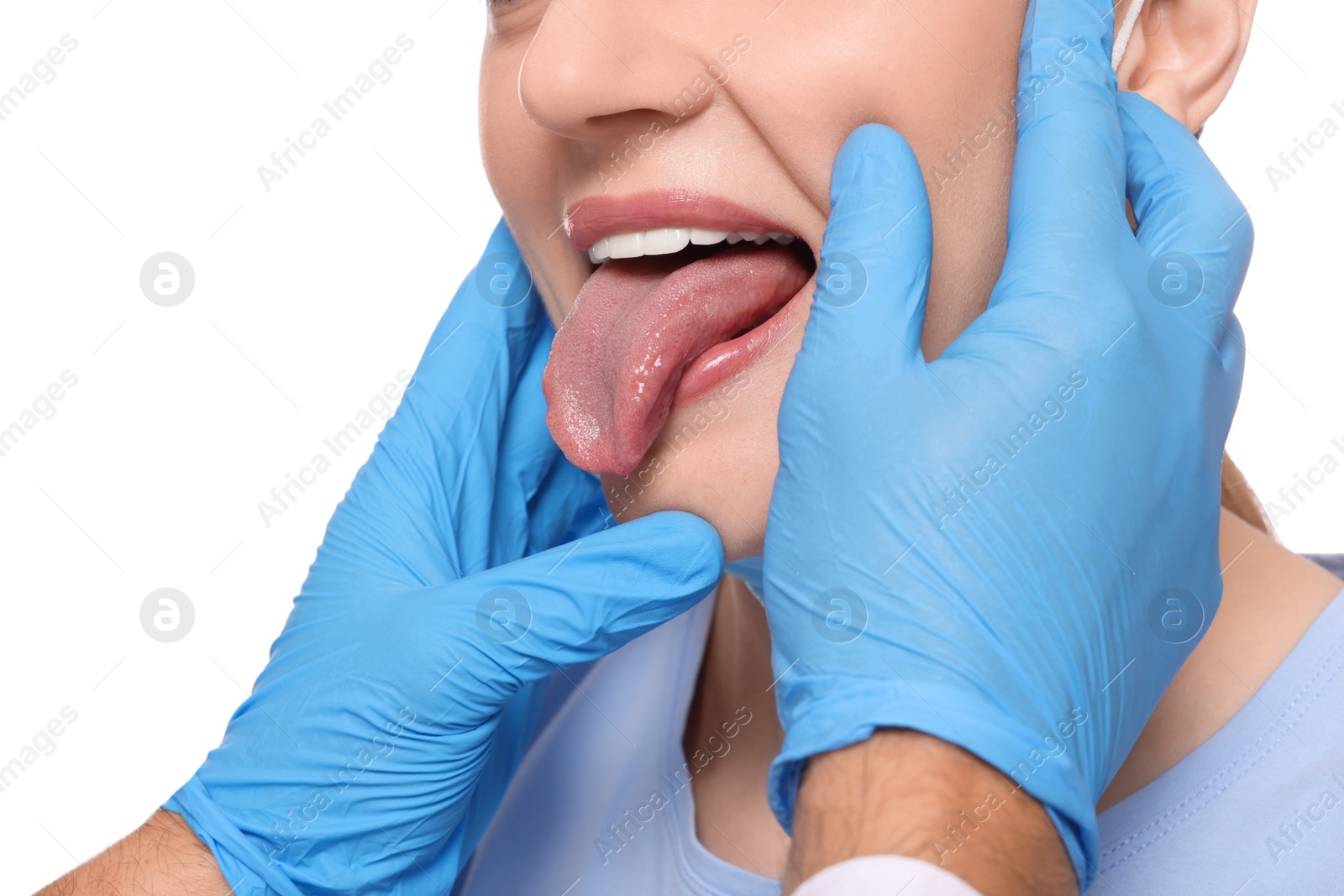 Photo of Doctor examining woman`s oral cavity on white background, closeup