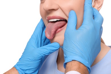 Doctor examining woman`s oral cavity on white background, closeup