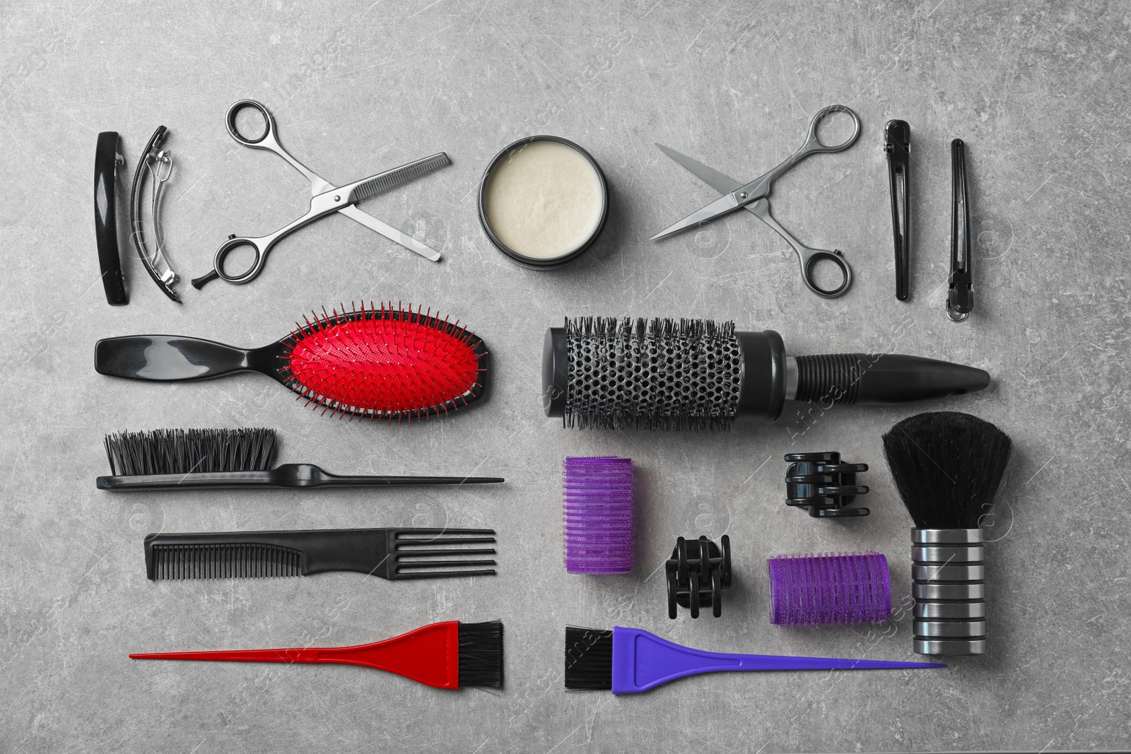 Photo of Professional hairdresser set on grey background