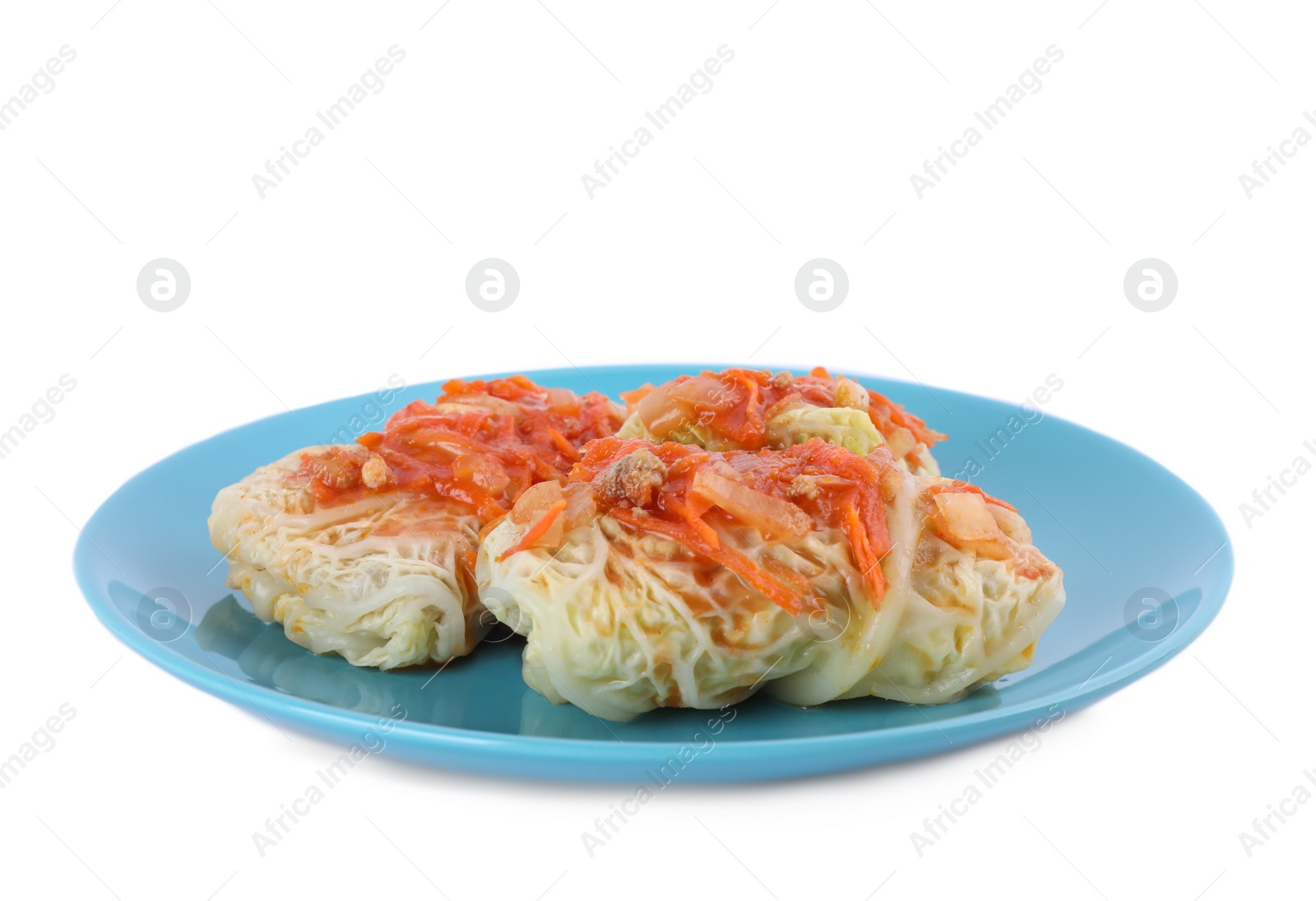 Photo of Plate with delicious cabbage rolls isolated on white