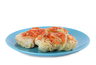 Photo of Plate with delicious cabbage rolls isolated on white