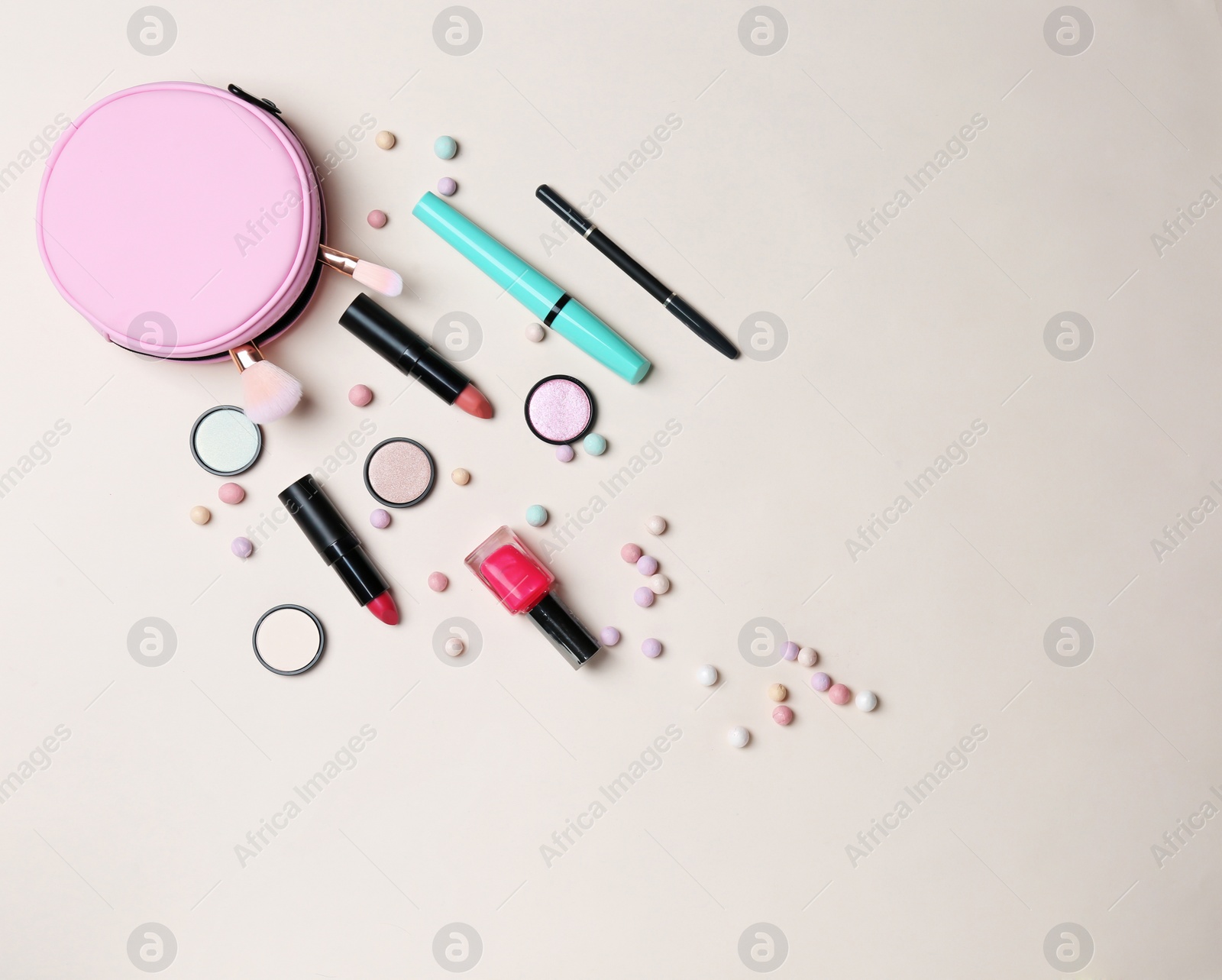 Photo of Decorative makeup products on color background