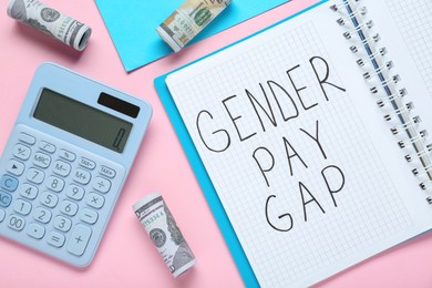Photo of Gender pay gap. Notebook, calculator and banknotes on color background, flat lay