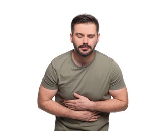 Photo of Man suffering from stomach pain on white background
