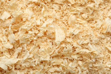 Dry natural sawdust as background, closeup view